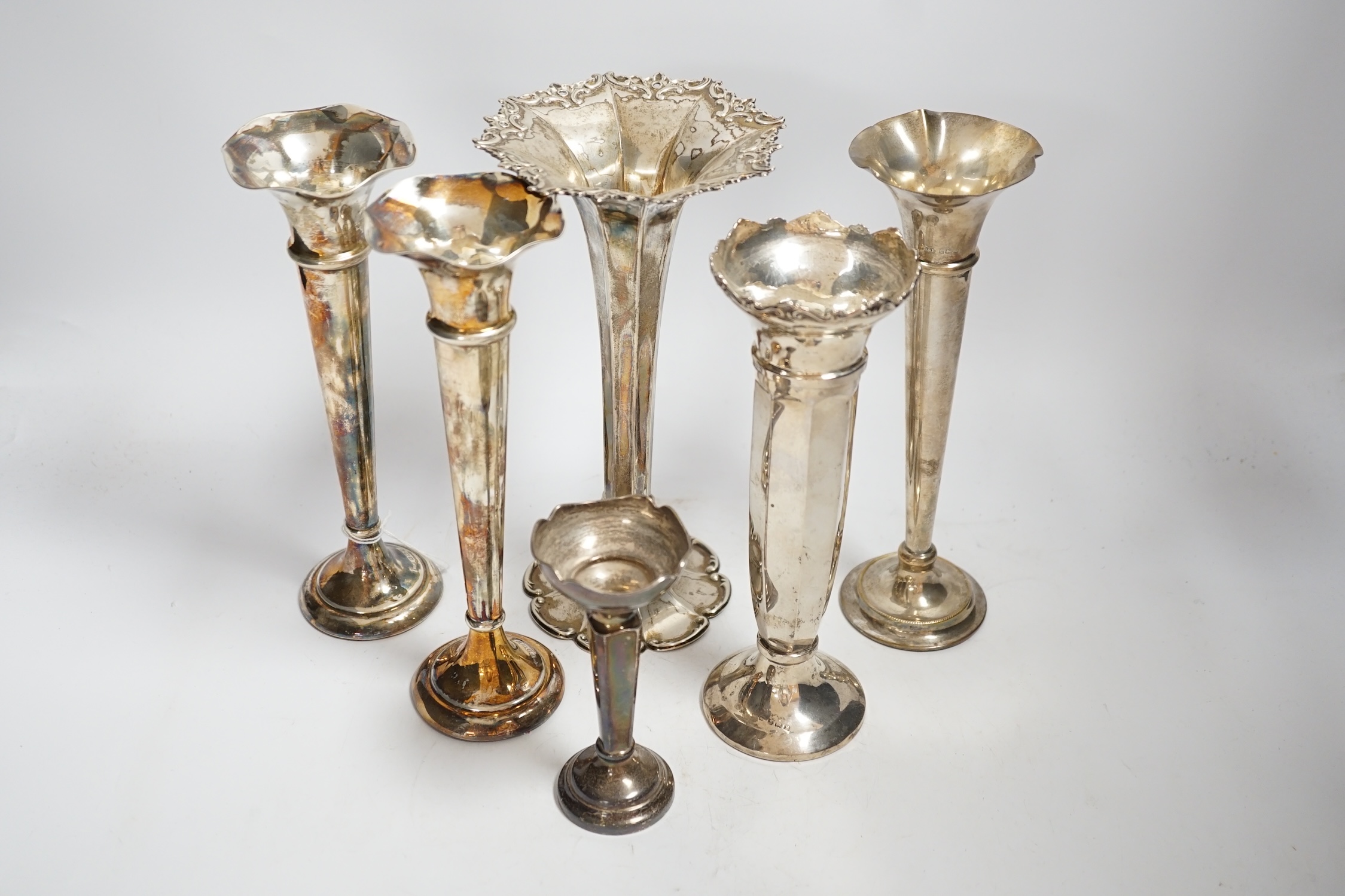Six assorted early 20th century and later silver mounted specimen vases, including pair by Henry Matthews, Birmingham, 1912, 22.7cm.